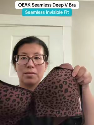 TikTok post by @iamjulieellis for OEAK-Bras. Caption reads: [...] #ComfortableBra #WomensEssentials @OEAK-Bras.