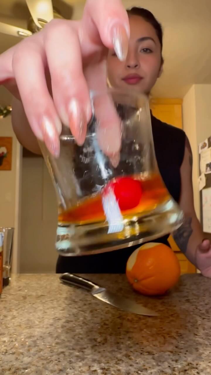 Instagram post by @itsjusstangie for Woodford Reserve. Caption reads: How are all my chefs doing this Holiday season?....