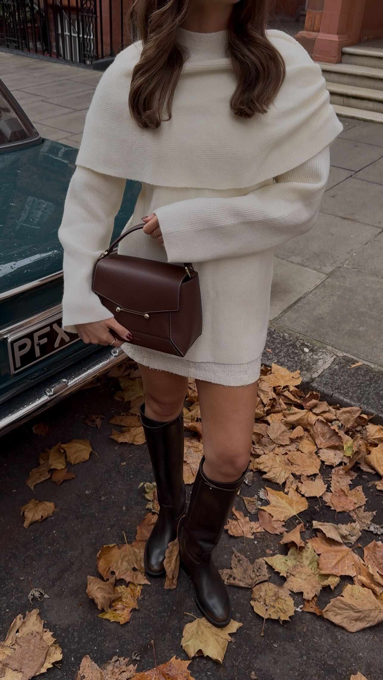 Instagram post by @amybethvdl for Strathberry. Caption reads: [...] because not enough people saw my new....