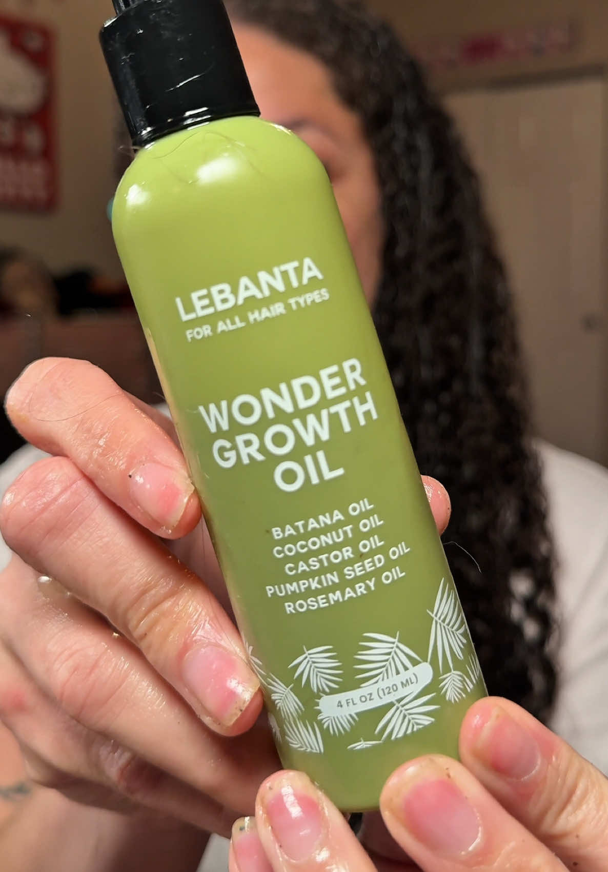 TikTok post by @brandi.reviews for Lebanta Haircare. Caption reads: @Lebanta Haircare #lebanta #lebantaoil #hairgrowth....