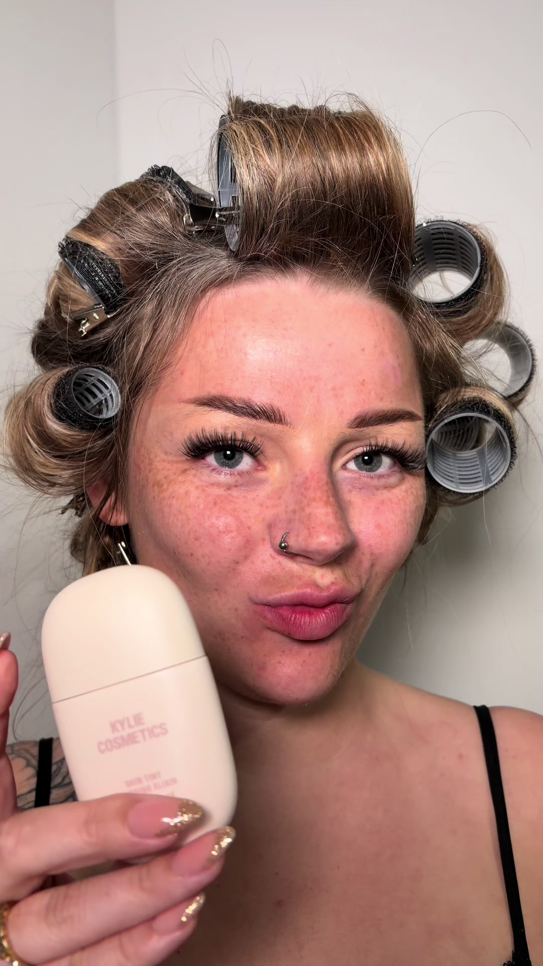 TikTok post by @daryann_paris for Kylie Cosmetics. Caption reads: Me and the @Kylie Cosmetics Skin Tint 🤝🤝 It's on....