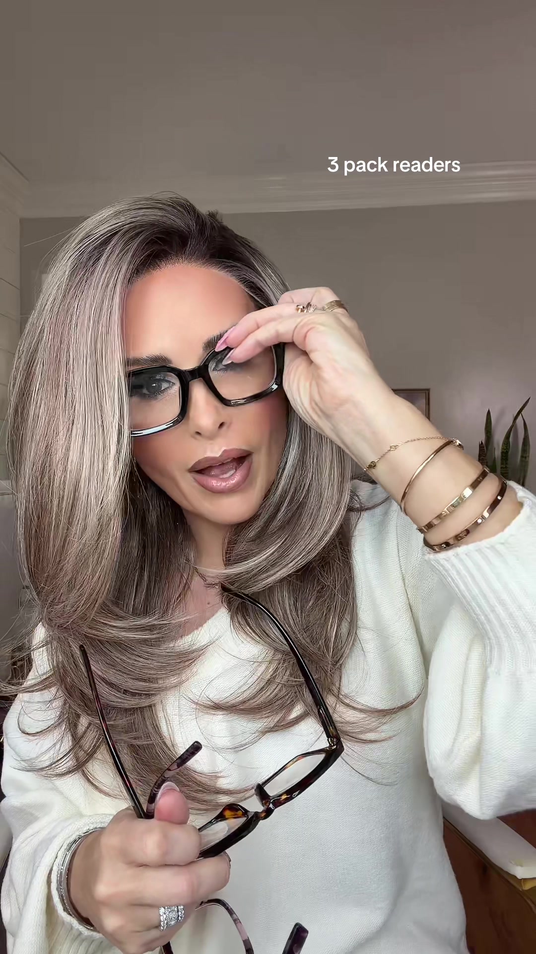 TikTok post by @thehairhoneys for RESJOK Reading Glasses. Caption reads: 3 pack readers @RESJOK READING GLASSES.