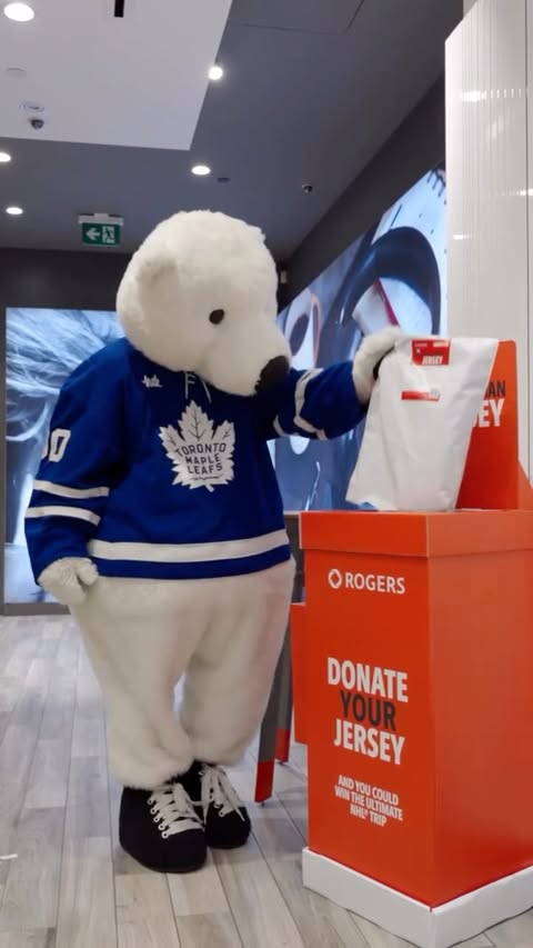 Instagram post by @officialcarltonthebear for Rogers. Caption reads: @rogers just launched The Great Canadian Jersey....