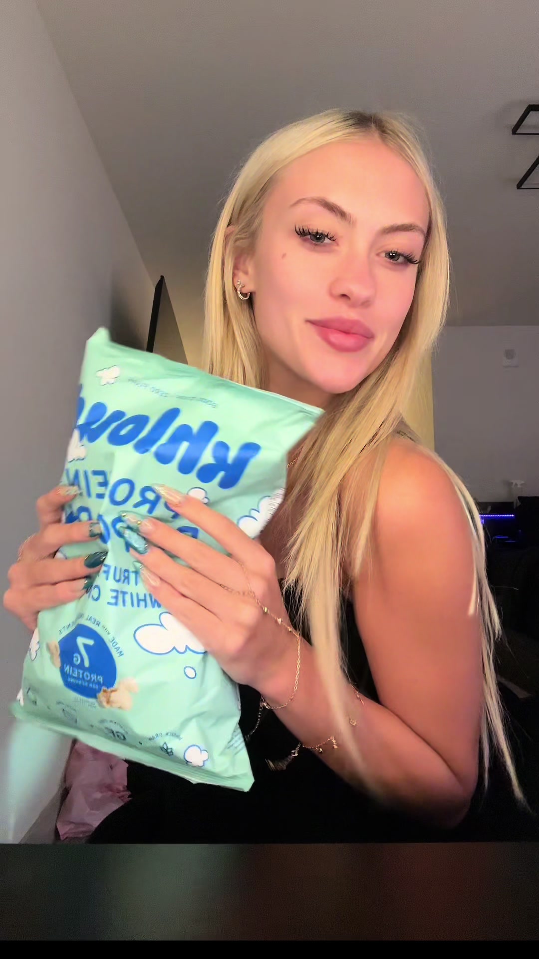 TikTok post by @haileyy.cutlerr for KhloudFoods. Caption reads: new flavor just dropped!! @KhloudFoods....