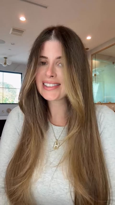 Instagram post by @amandaleehair for Kristin Ess Hair. Caption reads: @kristinesshair Signature Gloss in Crystal Quartz....