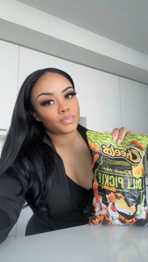 Instagram post by @caramel_chris for Cheetos. Caption reads: #Cheetos_Partner still processing this collab....