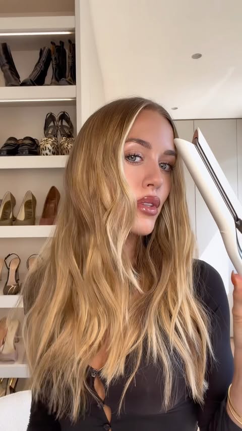 Instagram post by @lottietomlinson for ghd hair. Caption reads: [...] change the game completely! The new @ghdhair....