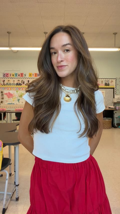 Instagram post by @misspugz for Rent the Runway. Caption reads: today’s #teacherootd called for another pop of red....