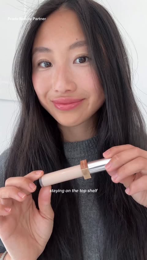 Instagram post by @judyxkam for Prada Beauty. Caption reads: #PradaBeautyPartner The kind of concealer that....