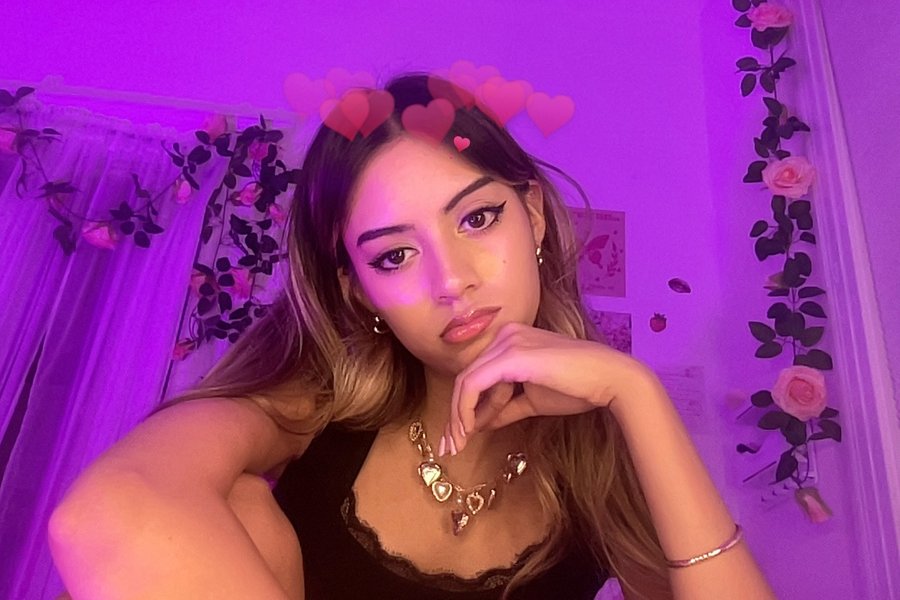 Instagram post by @alanalintao for Urban Outfitters. Caption reads: me genuinely kicking my spiderman socks and....