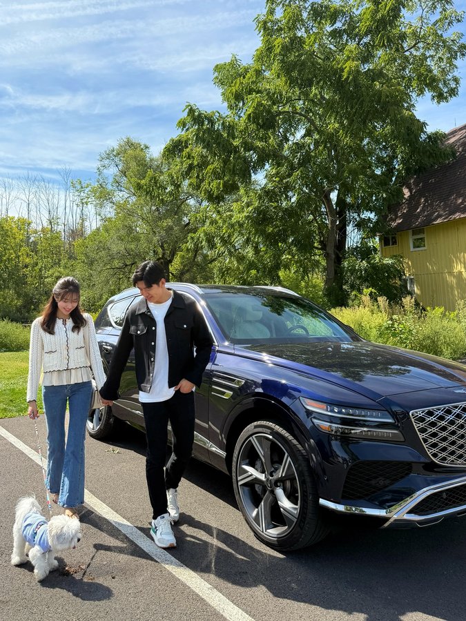 Instagram post by @rayandjanny for Genesis USA. Caption reads: family roadtrip redefined @genesis_usa....