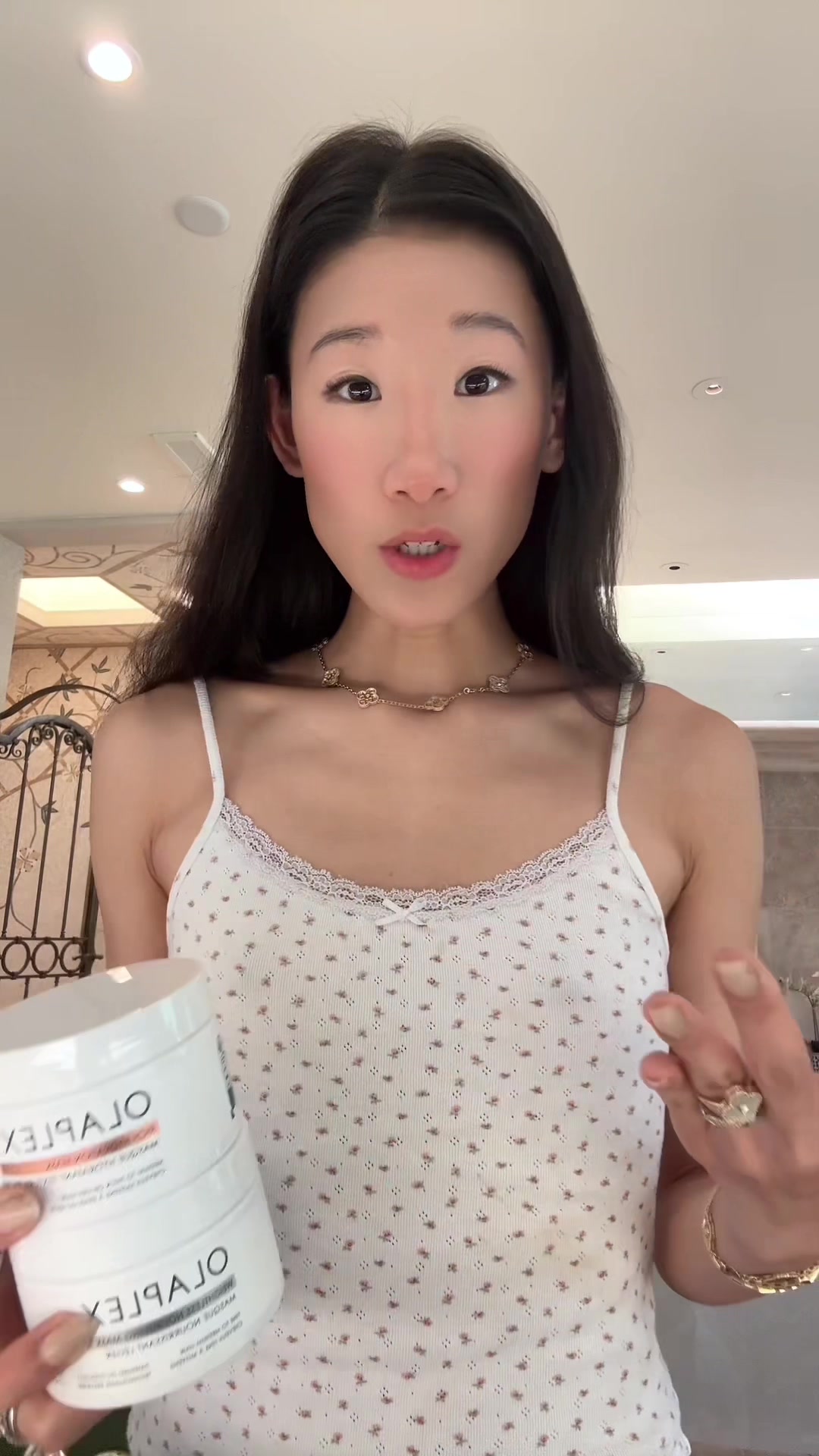 TikTok post by @beccaxbloom for OLAPLEX. Caption reads: [...] here’s the mask I kept for myself 👀....