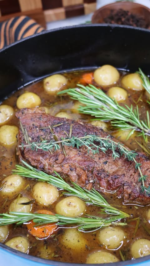 Instagram post by @cookingkatielady for ButcherBox. Caption reads: Apple Cider Pot Roast 🥩 

👉 Like this reel &....