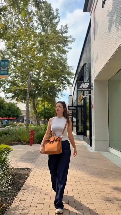 Instagram post by @hellofromseda for Teddy Blake. Caption reads: [...] and effortless luxury of my Teddy Blake bag.....