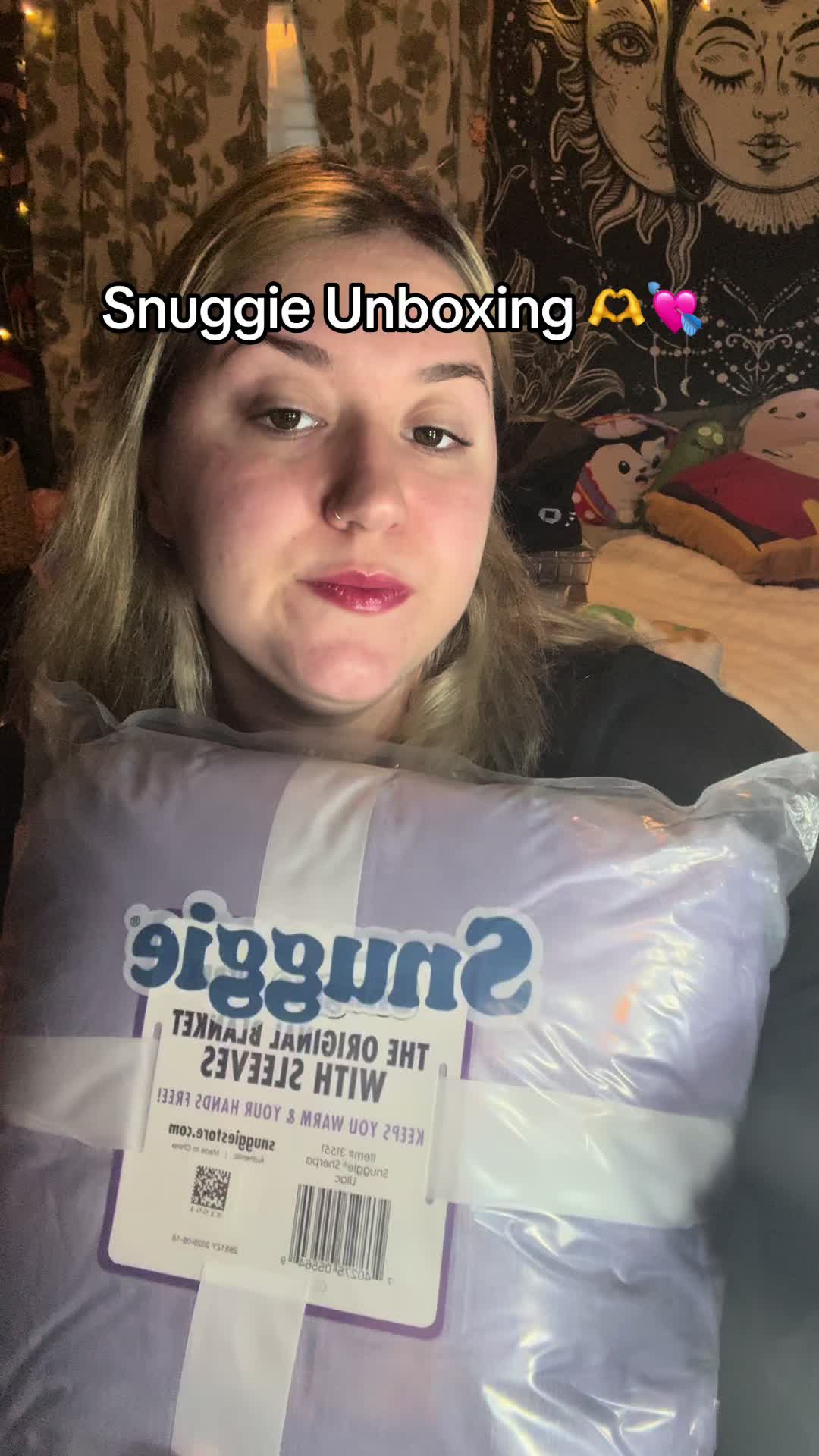 TikTok post by @kimberlymulgrew for Snuggie. Caption reads: [...] with all these cold temperatures!....