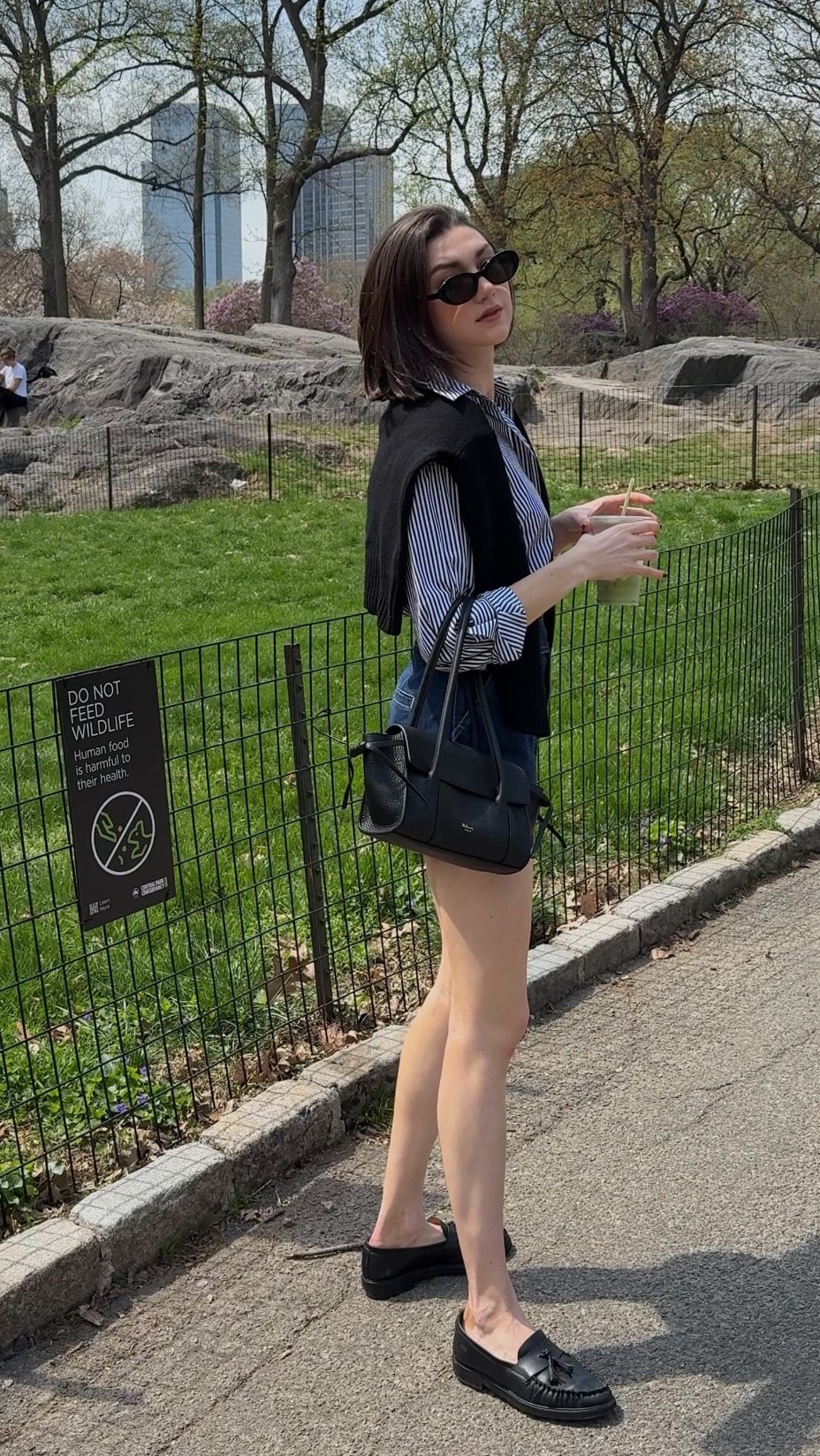 Instagram post by @katee.bartlett for Mulberry. Caption reads: spring days in the city are my favorite….carrying....