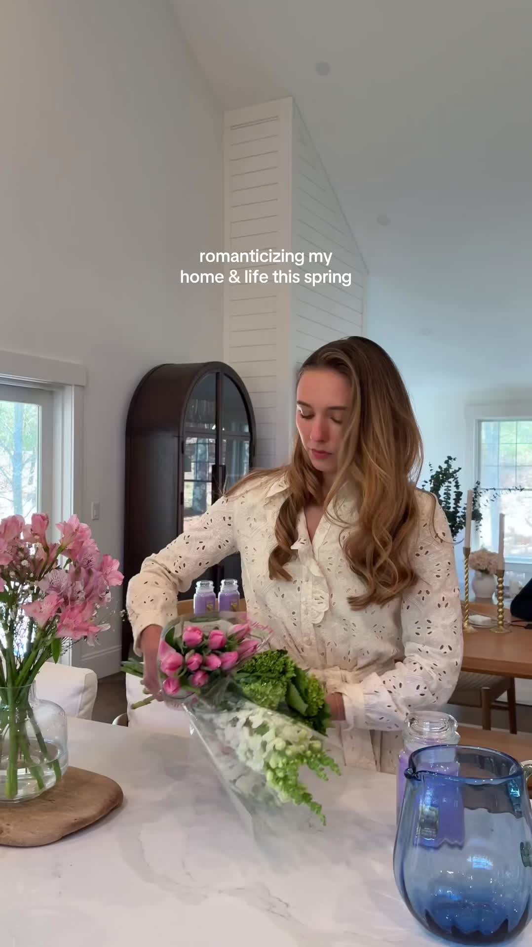 TikTok post by @blake.swanson for Yankee Candle. Caption reads: getting my house in the spring vibe with fresh....