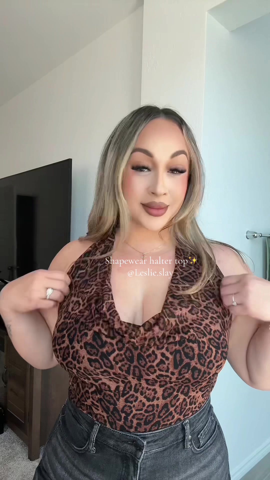TikTok post by @leslie.slay for Popilush. Caption reads: @Popilush LLC shape wear halter top 🐆 #popilush....