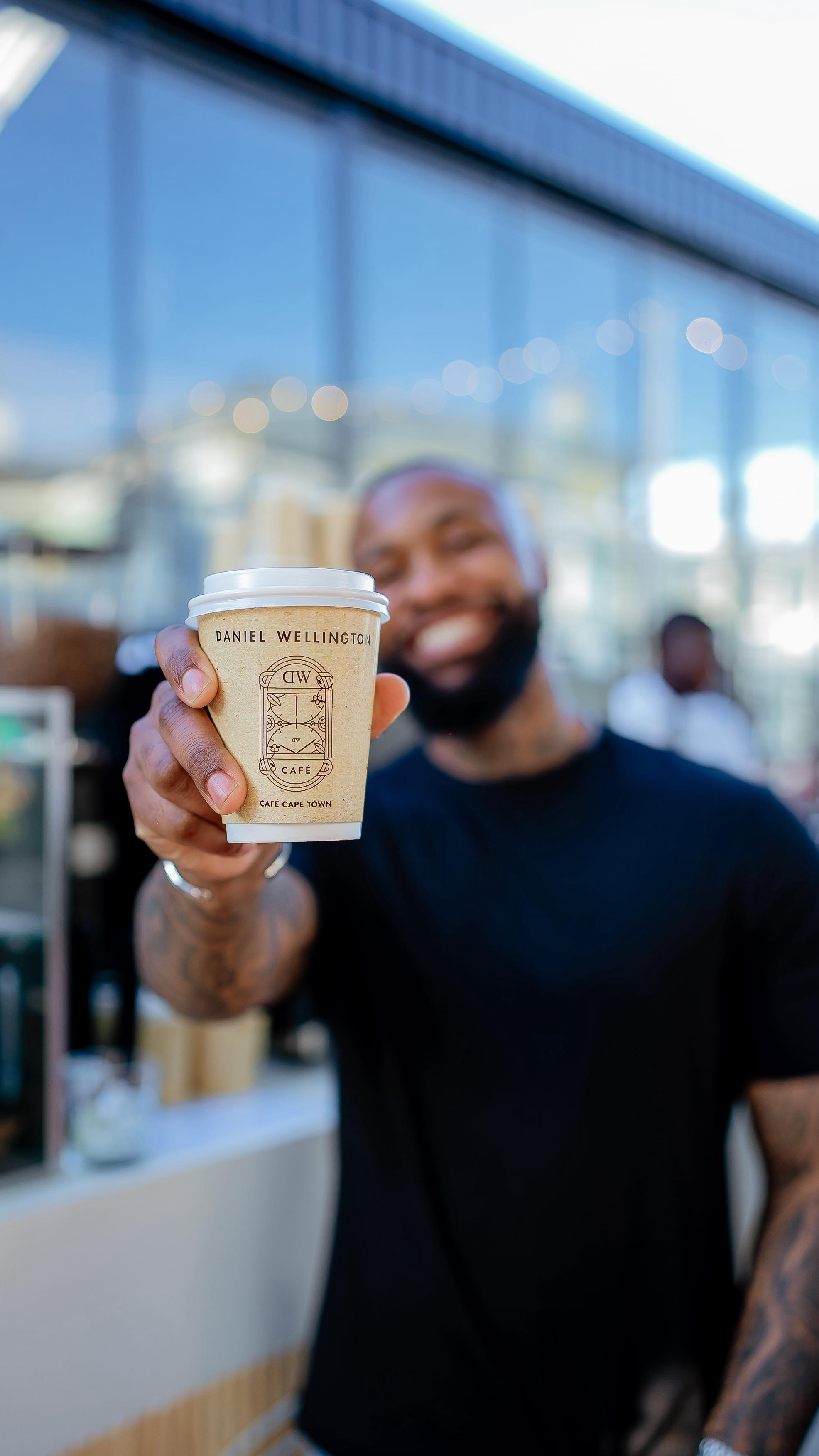 Instagram post by @tshegokoke for Daniel Wellington. Caption reads: A massive thank you to everyone who joined us at....