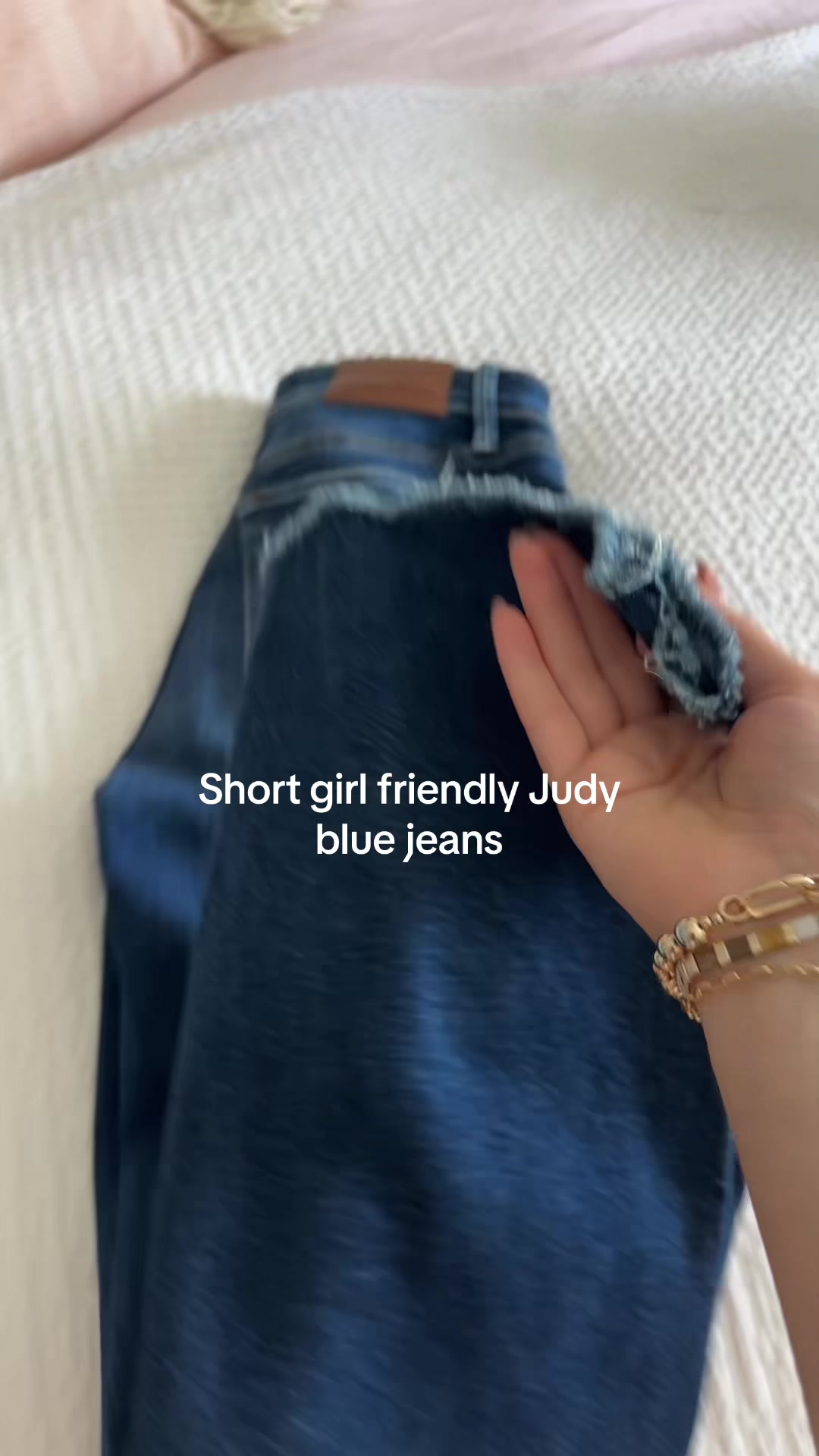 TikTok post by @kristen.falco for Freckled Poppy. Caption reads: Finally a pair of high rise, dark wash, NON....