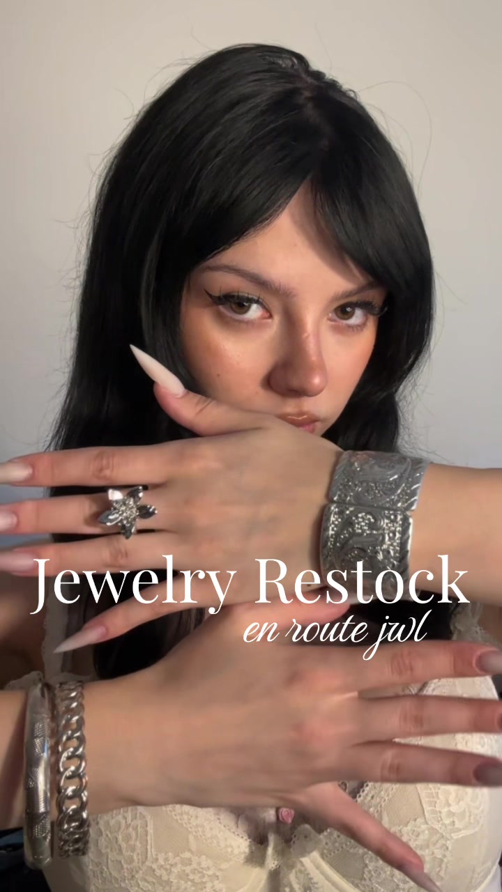 TikTok post by @strawberrykiss_3 for En Route Jewelry. Caption reads: @en route jewelry new jewelry rotation [...].
