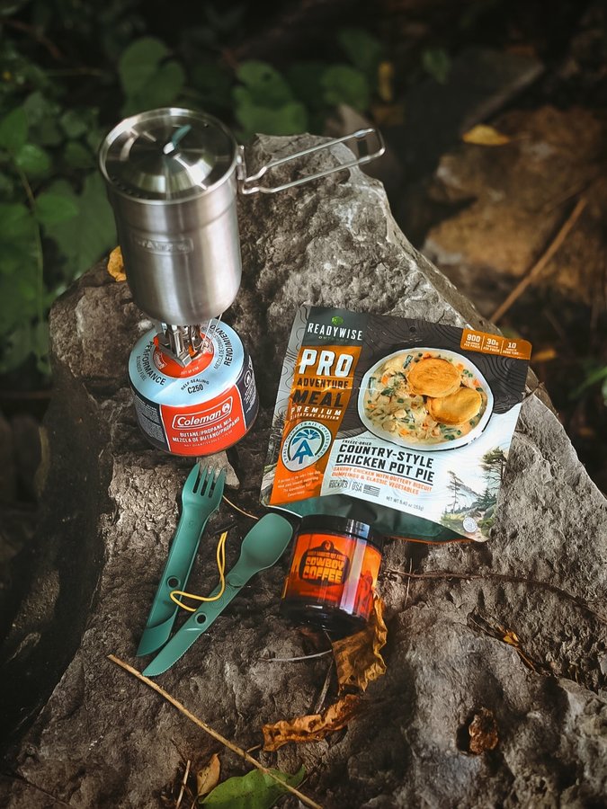 Instagram post by @honeycutt.outdoors for BattlBox. Caption reads: Epic lunch today! Tried out this new Cowboy Coffee....