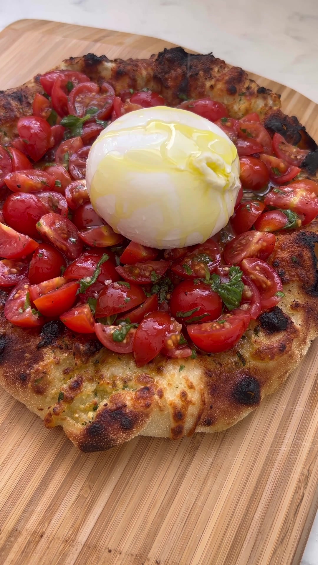 TikTok post by @_lacebakes_ for Ooni. Caption reads: [...] but let’s make it in the brand new @Ooni....