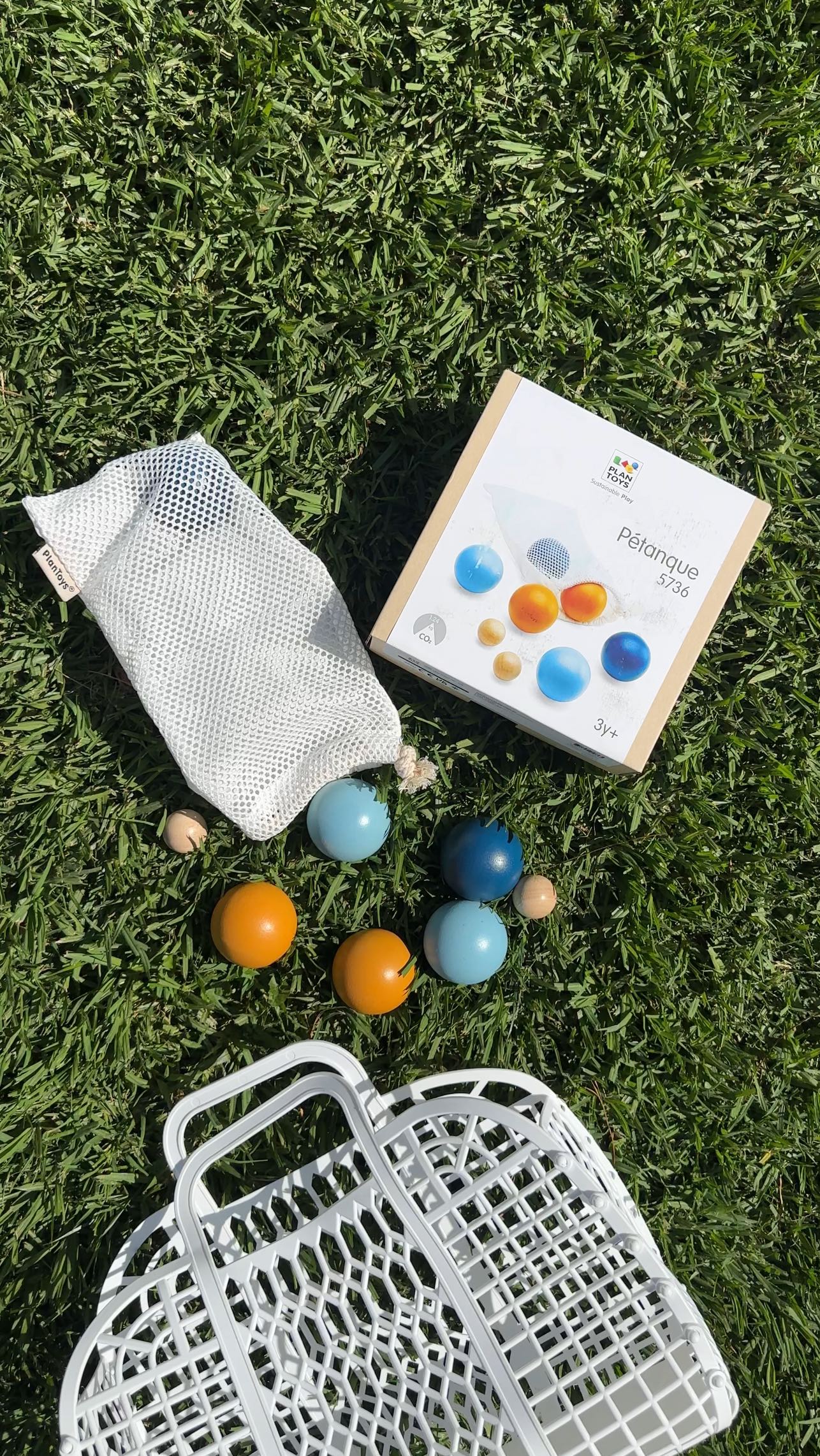 Instagram post by @alexiejiggs for PlanToys. Caption reads: [...] than to play a new game! #gifted PlanToys....
