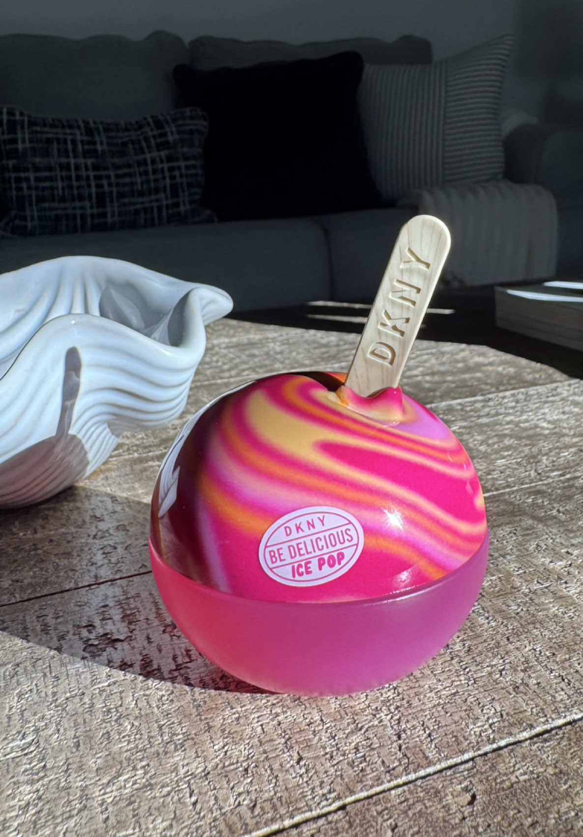 TikTok post by @faigilove for DKNY. Caption reads: Ice pop berry cherry @DKNY This perfume is simply....