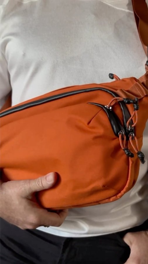 Instagram post by @carlosdnobrega for Orbitkey. Caption reads: The Orbitkey Urban Sling – where style meets....