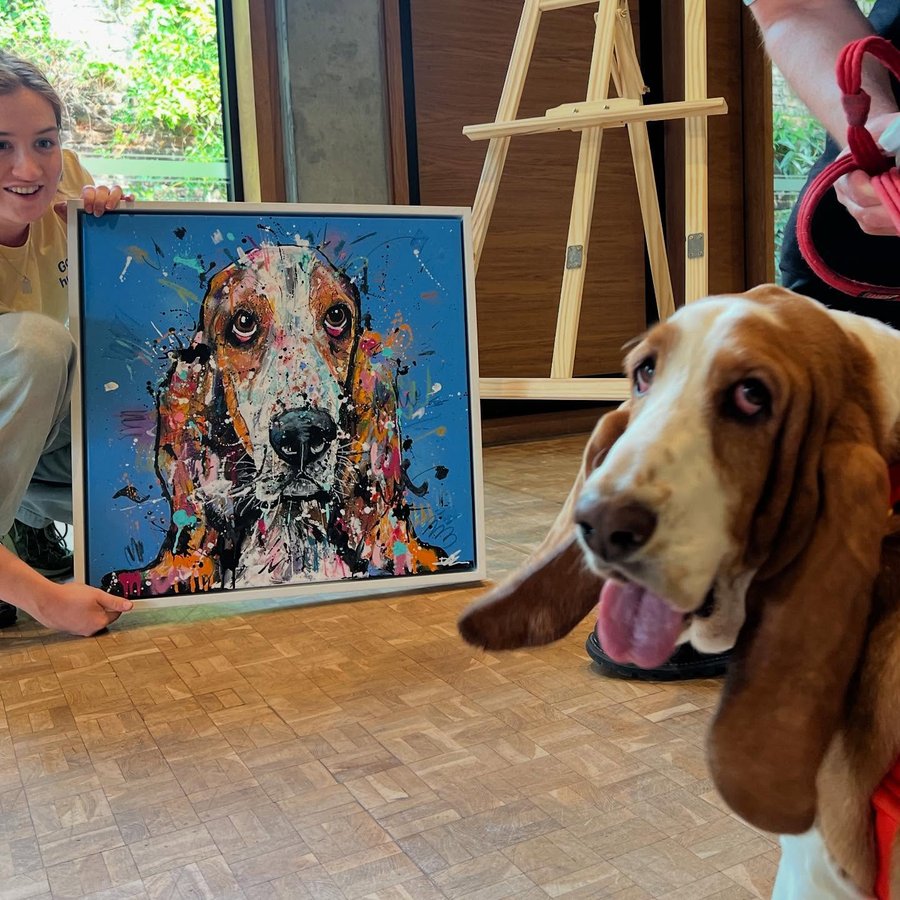 Instagram post by @rosie.basset for Butternut Box. Caption reads: Such an amazing day! Unveiling of my painting from....