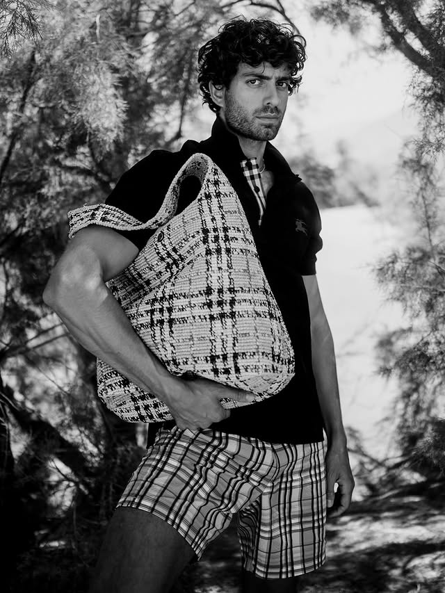 Instagram post by @andrewgeorgiades for Burberry. Caption reads: @burberry 🇬🇷🇬🇷🇬🇷 by @lucaspossiede Ad.
