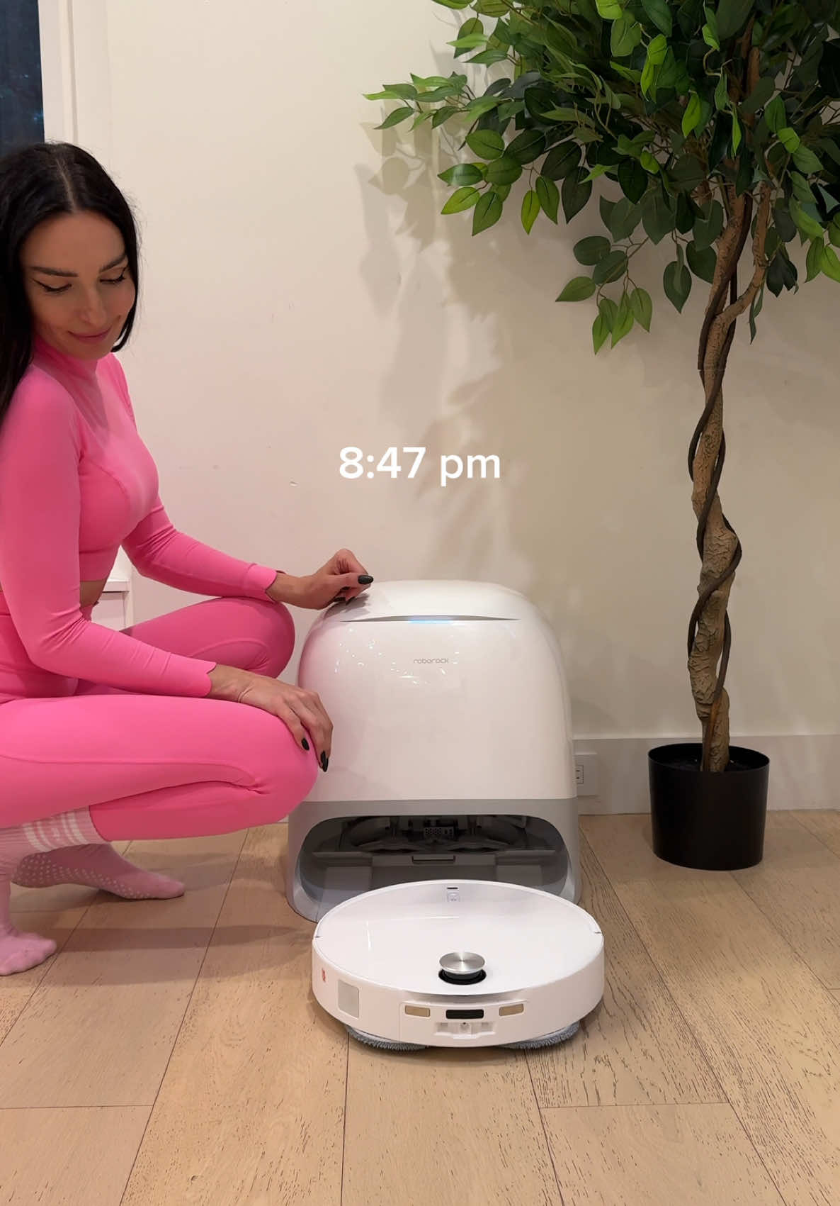TikTok post by @annatwinsies for Roborock. Caption reads: ASMR MOM NIGHT TIME ROUTINE 🌙✨ Elevate your home....
