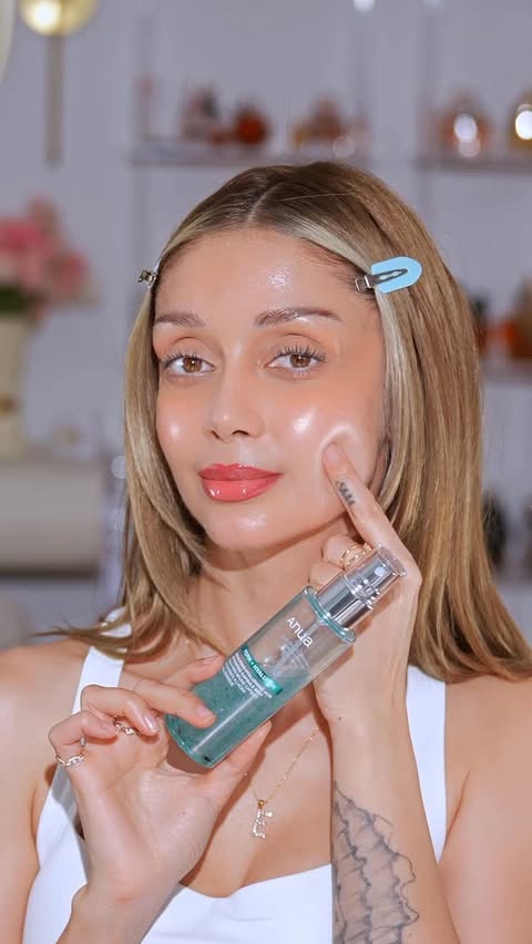 Instagram post by @elnaz_golrokh for Anua. Caption reads: Obsessed with the new ANUA PDRN Collagen Glow....