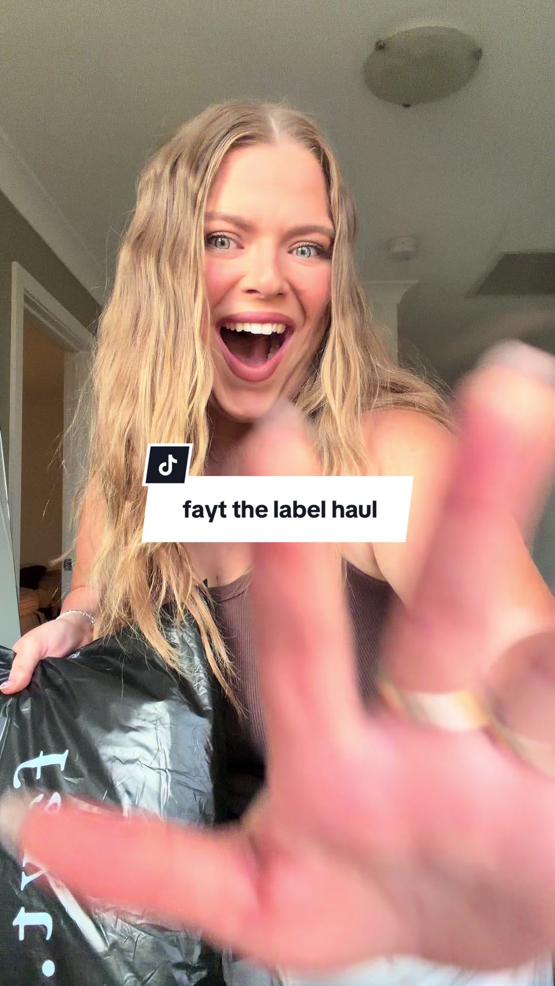 TikTok post by @kateelizabethsharp for FAYT The Label. Caption reads: [...] pieces! 🖤 who wants a try on haul?....