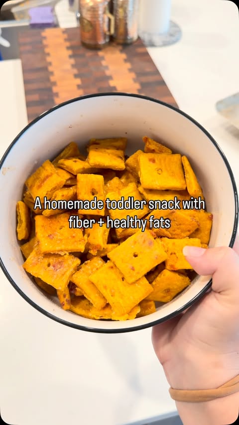 Instagram post by @ourlittlefirefamily for Grownsy. Caption reads: Cheesy sweet potato crackers are such an easy....