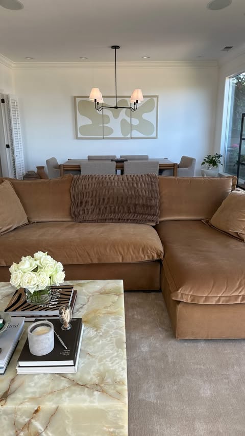 Instagram post by @tiffanyvpk for Rugs USA. Caption reads: truth is, size matters. living room refresh with....