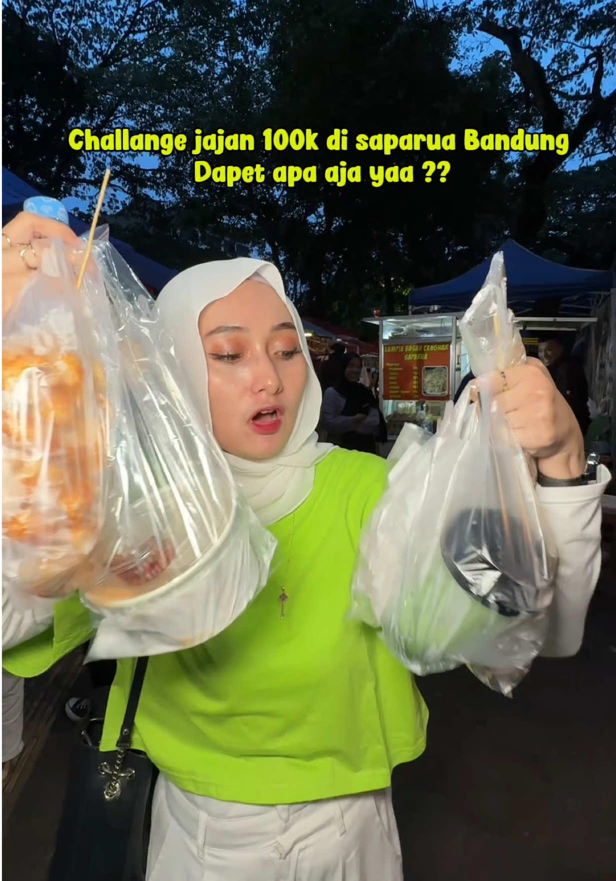 TikTok post by @hellowinda25 for inDrive. Caption reads: Ke saparua streetfood bawa uang 100k ternyata bisa....