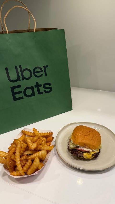 Instagram post by @natdoumkos for Uber Eats. Caption reads: [...] and you order local gems that are on....