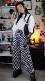 Instagram post by @amylouisehansonxo for Newrock. Caption reads: GRWM - casual alt outfit 🖤🤍 
You guys always go....