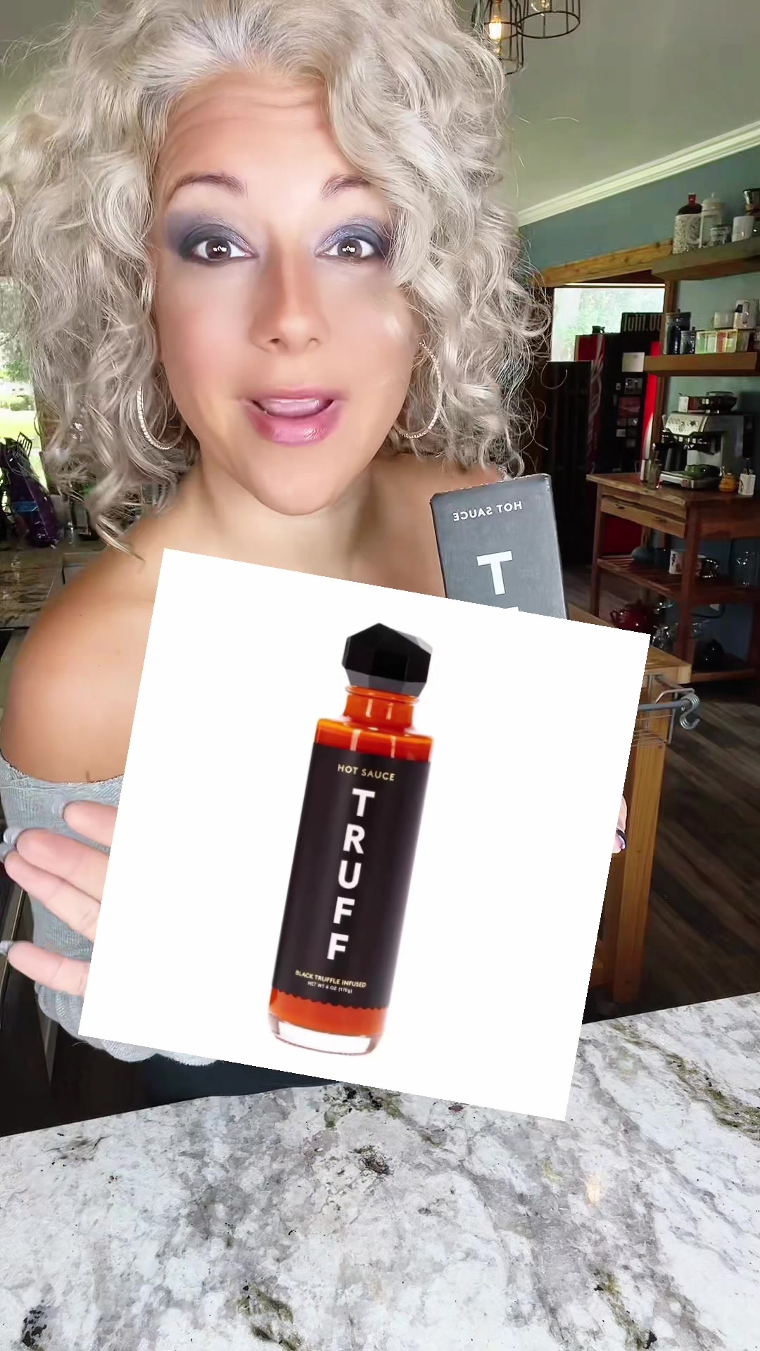 TikTok post by @lyndsaymadeit for Truff. Caption reads: [...] hot sauce! Such a high quality taste! @TRUFF....