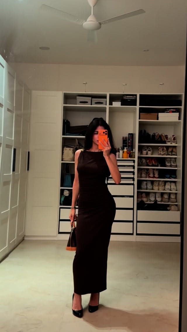 Instagram post by @anahitakaranjia for OMEGA. Caption reads: we got hotter @apple

outfit details:
dress @zara....