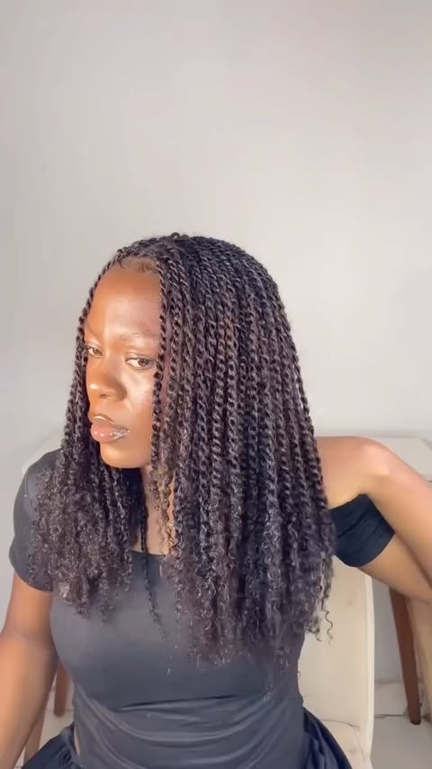 Instagram post by @qvrhair_official for QVR Hair. Caption reads: [...] #afrobulkkinkyhair #crochethairstyles....