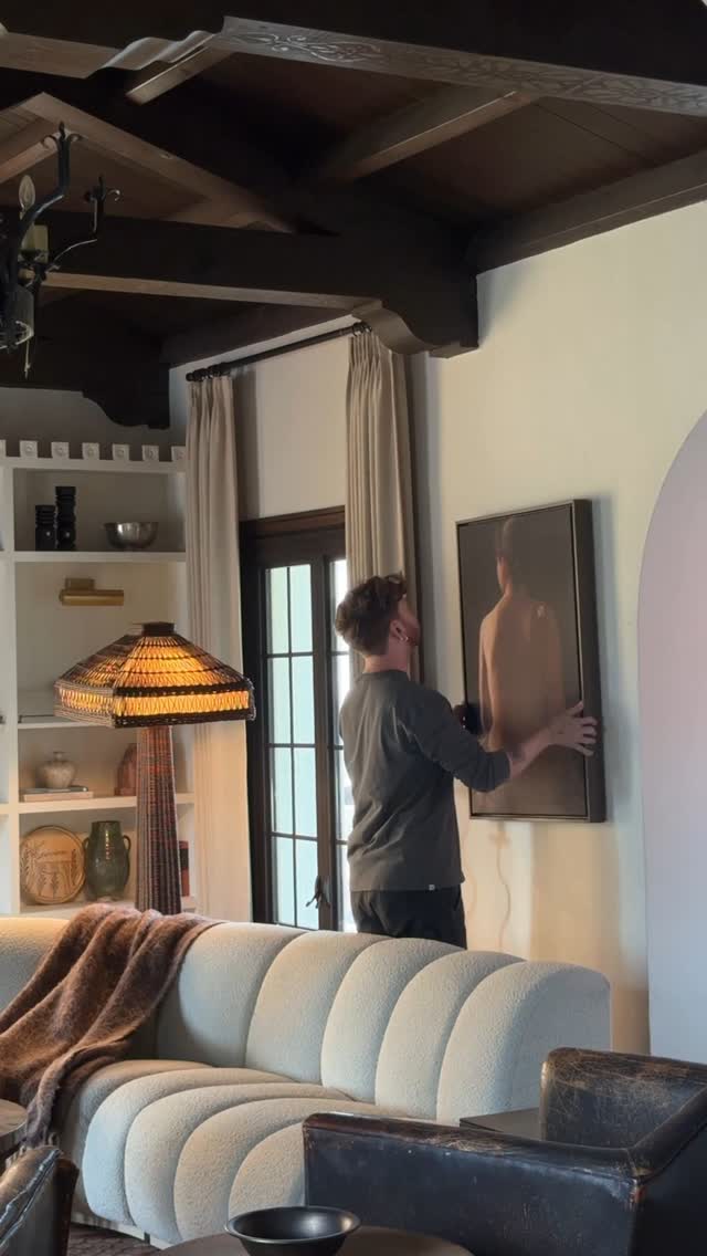 Instagram post by @lonefoxhome for Shutterfly. Caption reads: My home is filled with art that inspires me and....