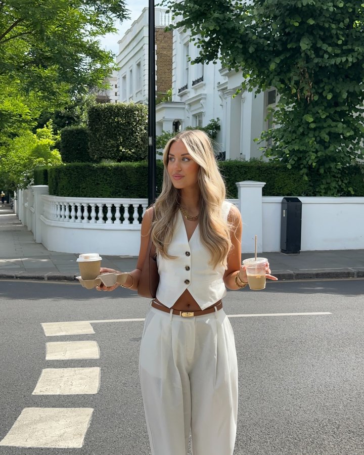 Instagram post by @katherine_bondd for The Couture Club. Caption reads: Summer in London 🫶🏻 @thecoutureclub ad.