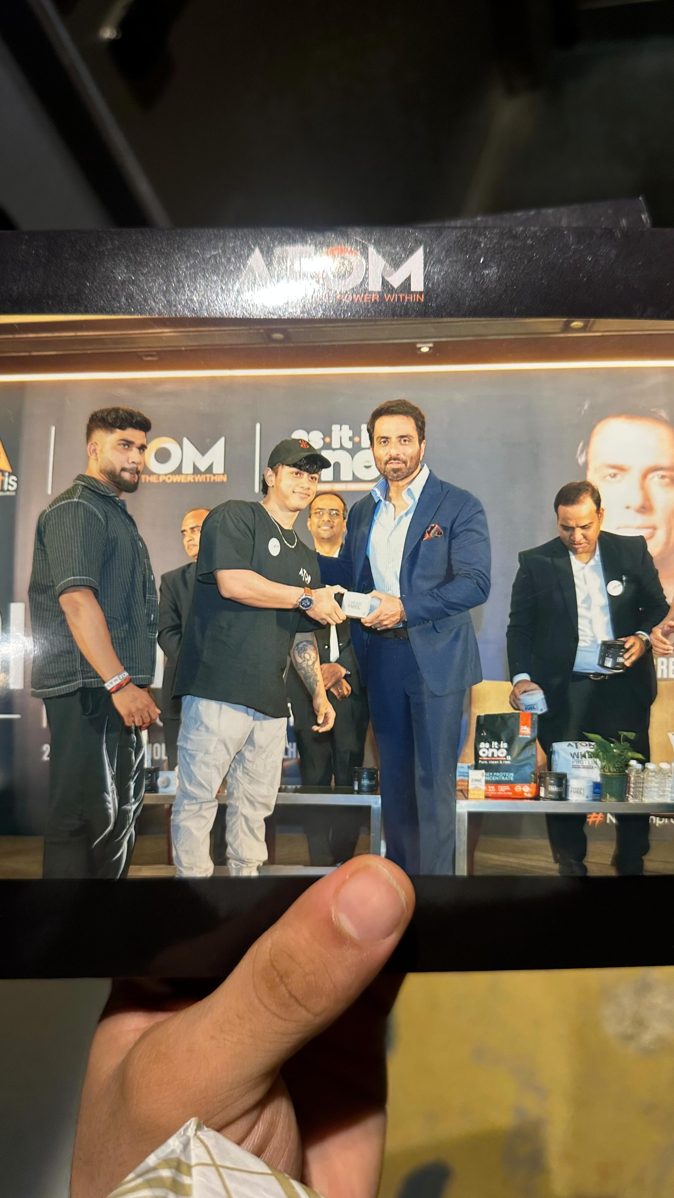 Instagram post by @aryan.kandari.fitness for As-it-is-nutrition. Caption reads: @sonu_sood sir 🫡 🔥 
New product launch of....