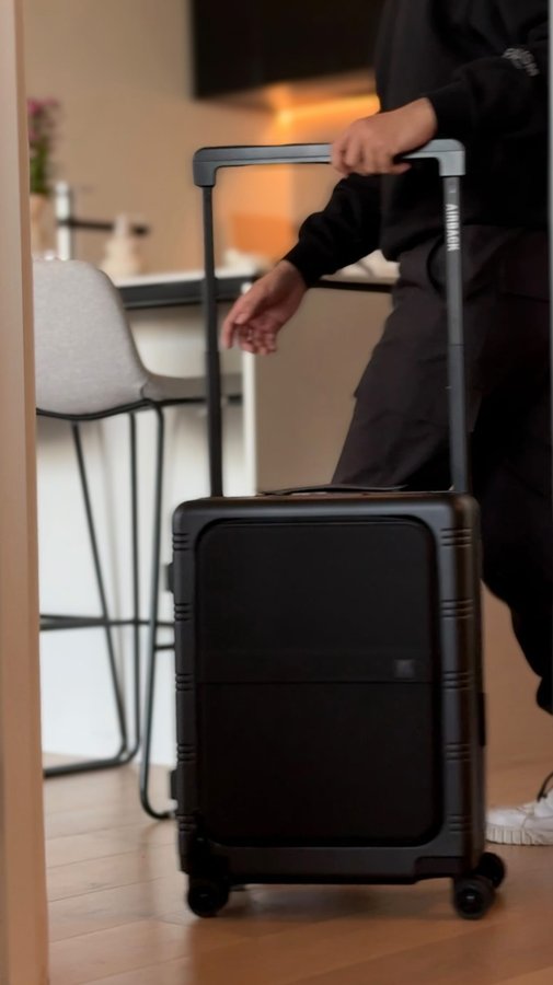 Instagram post by @tanuj.pov for Airback. Caption reads: [...] my suitcase. I recently got the new Airback....