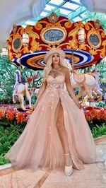Instagram post by @tawnyinwonderland for PUBLIC DESIRE. Caption reads: Let’s normalize wearing gowns on any given day....