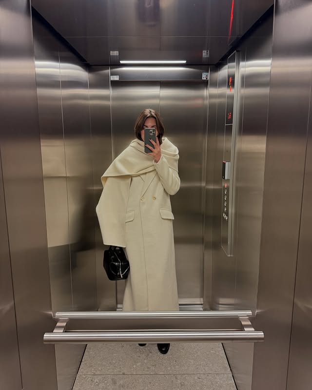 Instagram post by @ludovicaragazzo for Source Unknown. Caption reads: White coat 👌🏼 @sourceunknown_official #supplied.