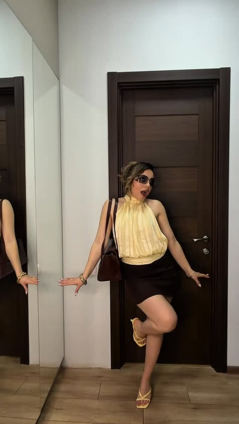 Instagram post by @zaalishvili_zalina for Dream Pairs Shoes. Caption reads: [...] butter yellow heels for spring from....